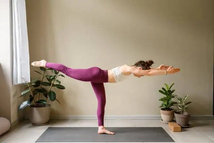 Achieving the Perfect Tone: How Often Should You Exercise for Results? 1 Woman doing Yoga exercise Pinner to help with toning the body.