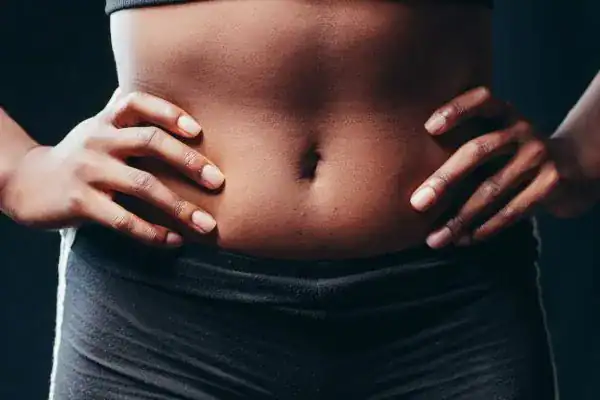 Toning Your Stomach: The Ultimate Guide to Achieving a Sculpted Stomach While Shedding Pounds 1 Image of a toned stomach after non surgical treatment Pinner
